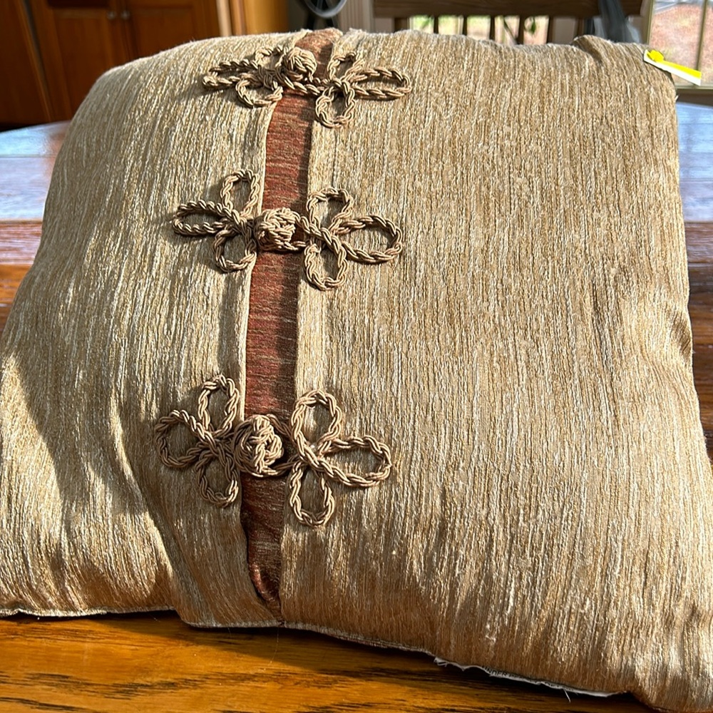 Unbranded braided cord accent pillow.  Approximately 16” square.